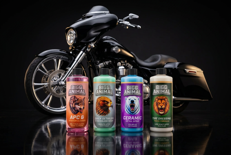 BIGG ANIMAL Core 4 bottles in front of a gloss-black custom bagger motorcycle